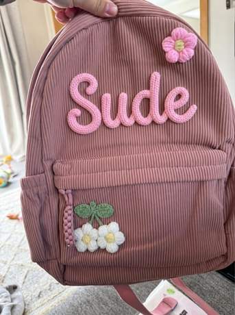 Sude isminin işlendiği gülkurusu renkli LumiaBag